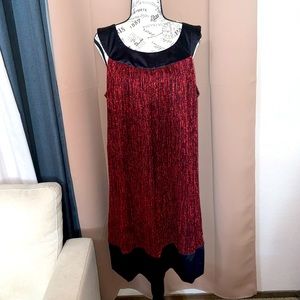 16W A-line dress lined and bow design back tie. Sparkly red fabric satin trim.